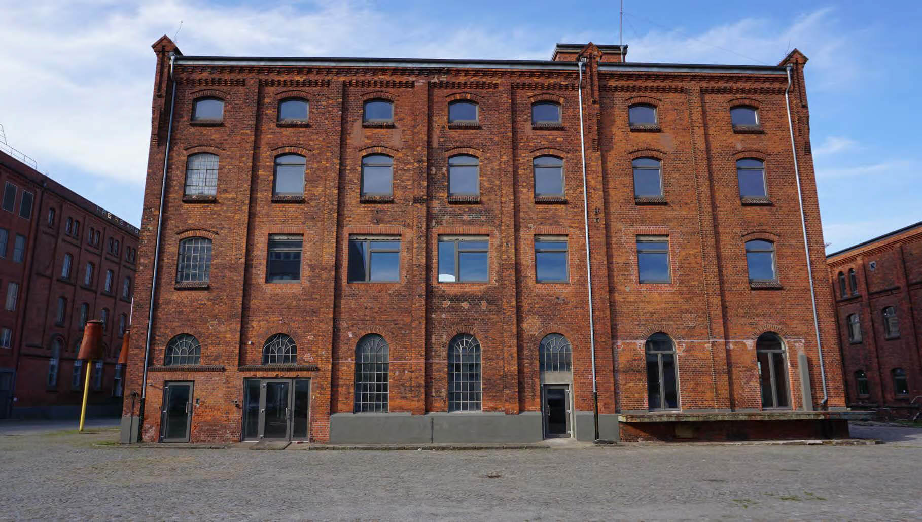 Gebäude im HAG Quartier von außen an einem schönen Sommertag